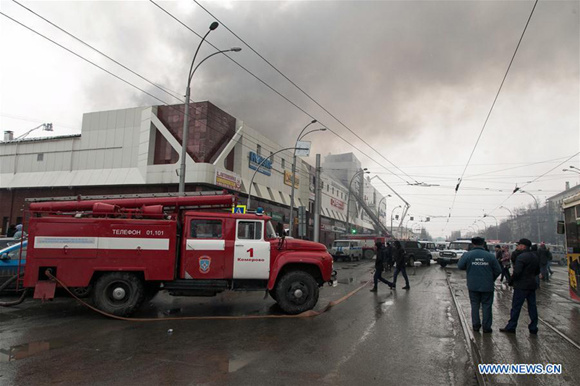 Members of the emergency ministry fire service try to put out the fire at the Zimnyaya Vishnya shopping mall in Kemerovo, Russia, on March 25, 2018. At least 37 people were killed in a fire in a shopping mall in south central Russia's Kemerovo city on Sunday, while many others are missing, TASS news agency reported, citing a source with firefighters. (Xinhua/Sputnik)