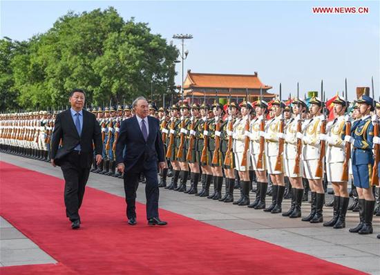 Chinese President Xi Jinping holds a welcome ceremony for Kazakh President Nursultan Nazarbayev before their talks in Beijing, capital of China, June 7, 2018. (Xinhua/Shen Hong)