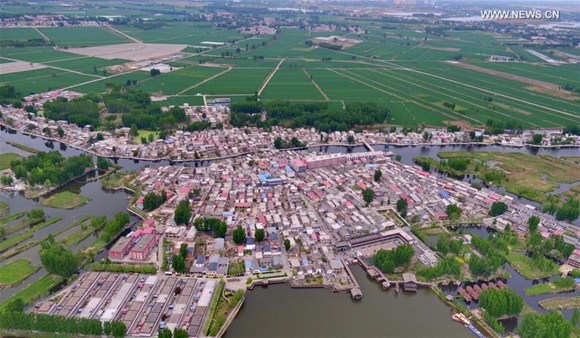 Aerial photo taken on April 25, 2017 shows the scenery of Baiyangdian, one of the largest freshwater wetlands in north China, in Anxin County, north China's Hebei Province. China announced the plan for Xiongan New Area, an economic zone about 100 kilometers south of Beijing, on April 1, 2017.  (Xinhua/Mou Yu)