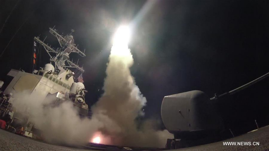 In this handout photo provided by the U.S. Navy, U.S. navy guided-missile destroyer USS Porter fires a tomahawk land attack missile in the Mediterranean Sea, April 7, 2017. (Xinhua/U.S. Navy)